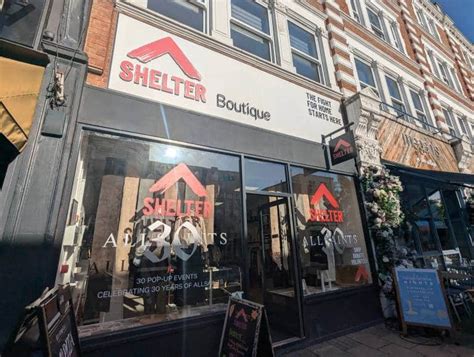 Shelter charity shop, High St, Wimbledon, London .